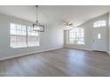 Bright and spacious living room with wood-look floors at 9859 W Potter Dr, Peoria, AZ 85382