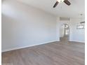 Open concept living space with wood-look floors at 9859 W Potter Dr, Peoria, AZ 85382