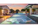 Stunning pool and spa with modern pergola and fire pit at 12651 S 71St St, Tempe, AZ 85287