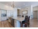 Gourmet kitchen with large island, stainless steel appliances, and custom cabinetry at 10512 E Cortez Dr, Scottsdale, AZ 85259