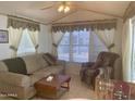 Cozy living room with comfortable seating and light flooring at 7750 E Broadway Rd # 10, Mesa, AZ 85208