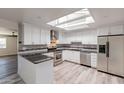 Modern kitchen with stainless steel appliances and granite countertops at 3708 E Joan De Arc Ave, Phoenix, AZ 85032