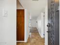 Entryway with tile floor and built-in storage at 3313 N 68Th St # 203, Scottsdale, AZ 85251