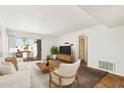 Living room with access to patio and neutral decor at 3313 N 68Th St # 203, Scottsdale, AZ 85251