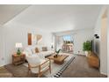 Living room with access to patio, stylish furniture at 3313 N 68Th St # 203, Scottsdale, AZ 85251