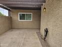 Covered patio area with concrete flooring and a pergola at 3345 E University Dr # 25, Mesa, AZ 85213