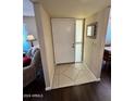 Bright entryway with tile flooring and a white door at 564 S Rochester St, Mesa, AZ 85206