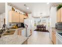Well-equipped kitchen with ample counter space and breakfast nook at 16121 W Silver Falls Dr, Surprise, AZ 85374