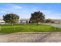 House exterior showcasing a well-maintained lawn and landscaping at 18333 E Sunnydale Dr, Queen Creek, AZ 85142