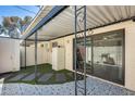 Private patio with artificial turf and patterned tile at 1319 N 44Th St, Phoenix, AZ 85008