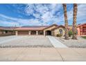 Single-story home with solar panels and a landscaped front yard at 18822 N Grandview Dr, Sun City West, AZ 85375