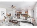 Virtually staged kitchen and living area, modern decor at 8531 N 64Th Ave, Glendale, AZ 85302