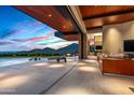 Indoor-outdoor living space with pool access at 42515 N 102Nd St, Scottsdale, AZ 85262