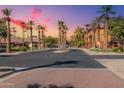 Community entrance and paved roadway at 14950 W Mountain View Blvd # 1203, Surprise, AZ 85374
