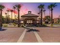 Gated community entrance with fountain at 14950 W Mountain View Blvd # 1203, Surprise, AZ 85374