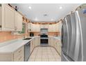 Modern kitchen with stainless steel appliances and light countertops at 245 N Aztec Trl, Wickenburg, AZ 85390