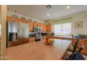 Well-equipped kitchen with ample cabinetry and stainless steel appliances at 29922 N Little Leaf Dr, San Tan Valley, AZ 85143