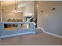 Spacious living room with high ceilings and elegant light fixture at 427 E Mayfield Dr, San Tan Valley, AZ 85143