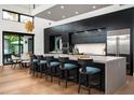 Modern kitchen with large island, stainless steel appliances, and ample counter space at 6201 E Calle Redonda --, Scottsdale, AZ 85251