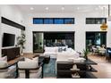 Open and spacious living area with modern furniture and high ceilings at 6201 E Calle Redonda --, Scottsdale, AZ 85251