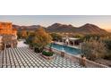 Large pool with patio and mountain views at 23036 N Via Ventosa Dr, Scottsdale, AZ 85255