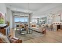 Open concept living room and kitchen with modern finishes at 19974 E El Nido Ln, Litchfield Park, AZ 85340