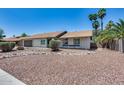 Charming single story home with rock landscaping and covered patio at 2616 S Extension Rd, Mesa, AZ 85210