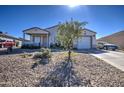 House exterior features a 1-car garage and desert landscaping at 9105 W Magnum Dr, Arizona City, AZ 85123