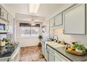 Bright kitchen with updated cabinets and appliances at 10418 N 97Th Dr # B, Peoria, AZ 85345