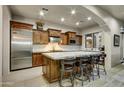 Gourmet kitchen with granite countertops and wood cabinetry at 3248 S Golden Barrel Ct, Gold Canyon, AZ 85118