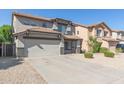 Two-story house with a double-car garage at 794 E Christopher St, San Tan Valley, AZ 85140