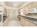 Bright kitchen features ample counter space and updated appliances at 3329 N 17Th Dr, Phoenix, AZ 85015
