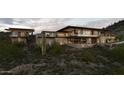 Stunning contemporary home nestled into the mountainside at 41521 N 75Th Pl, Cave Creek, AZ 85331