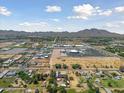 Aerial view of neighborhood, showcasing wide open spaces at 18526 E Cloud Rd, Queen Creek, AZ 85142