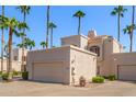 Two-story stucco home with attached garage and desert landscaping at 1301 W Coral Reef Dr, Gilbert, AZ 85233