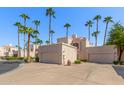Two-story stucco home with attached garage and desert landscaping at 1301 W Coral Reef Dr, Gilbert, AZ 85233