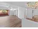 Bright living room with hardwood floors and access to balcony at 4303 E Cactus Rd # 441, Phoenix, AZ 85032