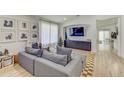 Bright and spacious Gathering room with comfortable seating and large TV at 35925 N 30Th Dr, Phoenix, AZ 85086