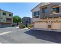 View of townhome garages and surrounding community at 2150 W Alameda Rd # 1273, Phoenix, AZ 85085