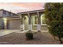 Charming single story home with arched entryway and attached garage at 20442 E Rosa Rd, Queen Creek, AZ 85142