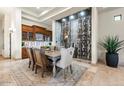 Formal dining room adjacent to a climate controlled wine cellar at 10721 E La Junta Rd, Scottsdale, AZ 85255