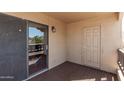 Private patio with sliding glass door and storage closet at 500 N Gila Springs Blvd # 204, Chandler, AZ 85226