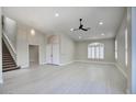 Spacious living room with high ceilings and tile flooring at 3981 N 155Th Ave, Goodyear, AZ 85395