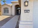 Front entry of the house with walkway and address number at 3981 N 155Th Ave, Goodyear, AZ 85395