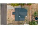 Directly above view of a home showing the roofline, yard, and driveway at 4301 E Bluefield Ave, Phoenix, AZ 85032