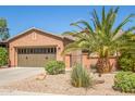 Beautiful one-story home, two-car garage, desert landscaping at 26723 N 127Th Dr, Peoria, AZ 85383
