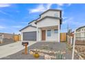 Modern two-story home with gray garage door and wood fence at 13036 N 20Th St, Phoenix, AZ 85022