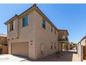 Two-story home with garage and balcony at 847 E Agua Fria Ln, Avondale, AZ 85323