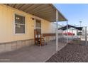 Mobile home with covered patio and fenced dog run at 501 E Ray Rd # 211, Chandler, AZ 85225