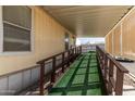 Wooden ramp leading to the mobile home entrance at 501 E Ray Rd # 211, Chandler, AZ 85225